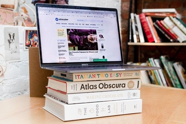 DIY monitor height fix with books